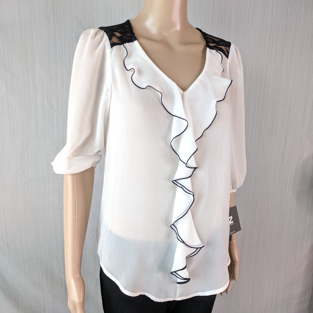 Sheer black and white ruffled top